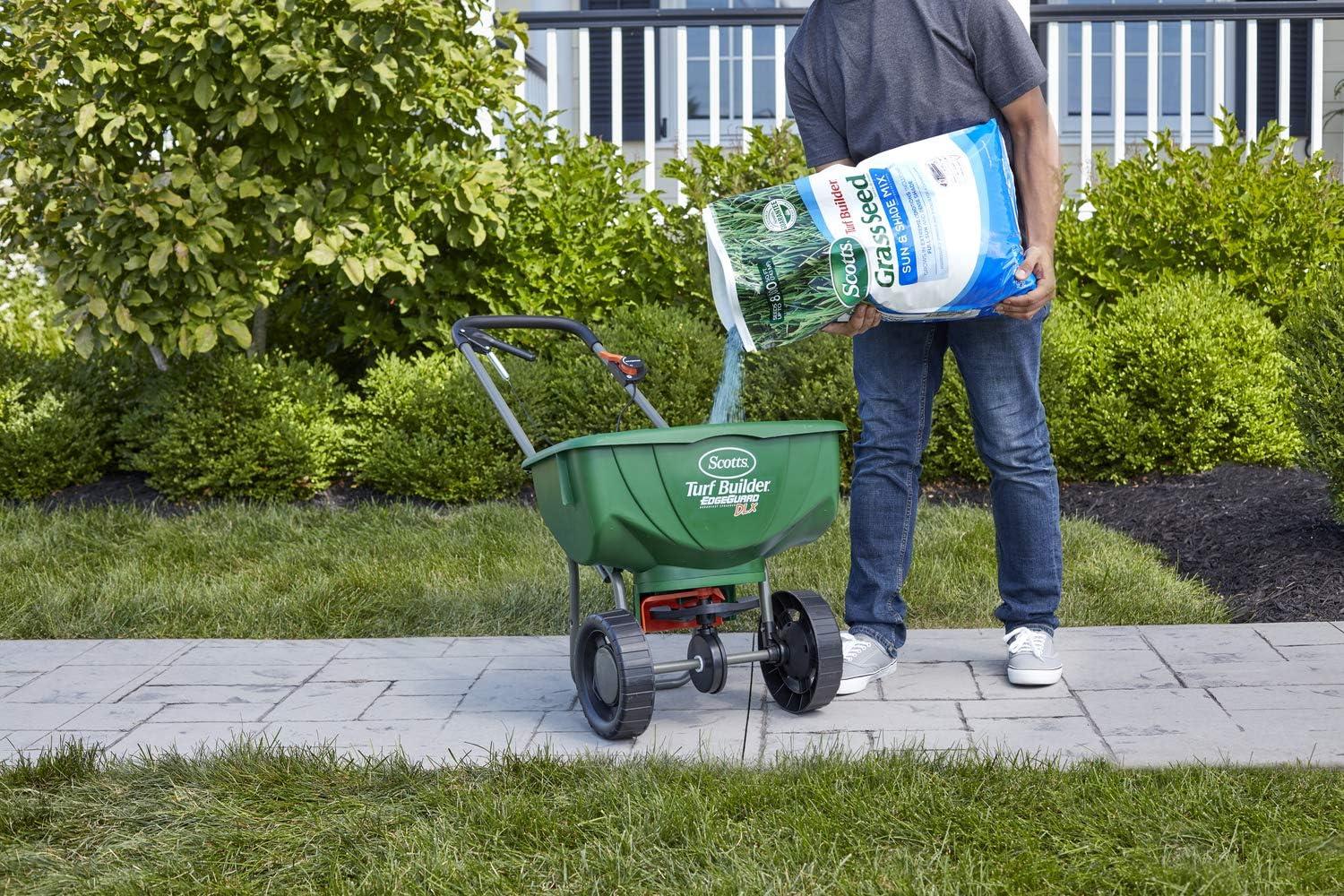 imageScotts Turf Builder Grass Seed Sun ampamp Shade Mix with Fertilizer and Soil Improver Thrives in Many Conditions 32 lbs20 lb