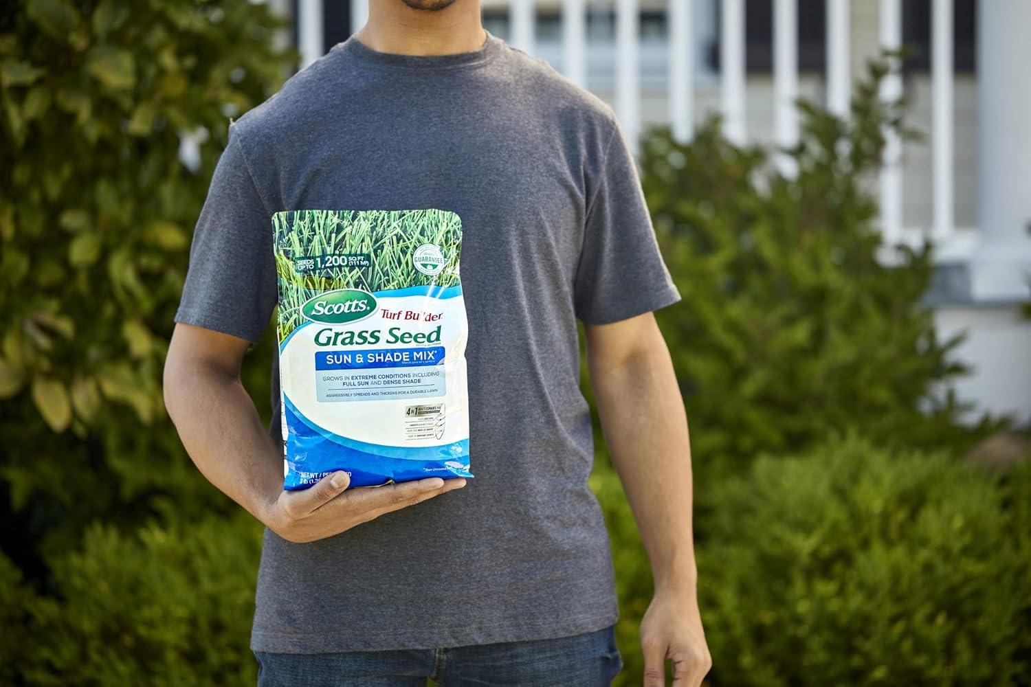 imageScotts Turf Builder Grass Seed Sun ampamp Shade Mix with Fertilizer and Soil Improver Thrives in Many Conditions 32 lbs3 lb